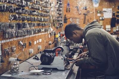 small business ERP - man in key workshop